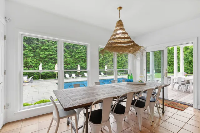 a kitchen with stainless steel appliances granite countertop a sink a stove and cabinets