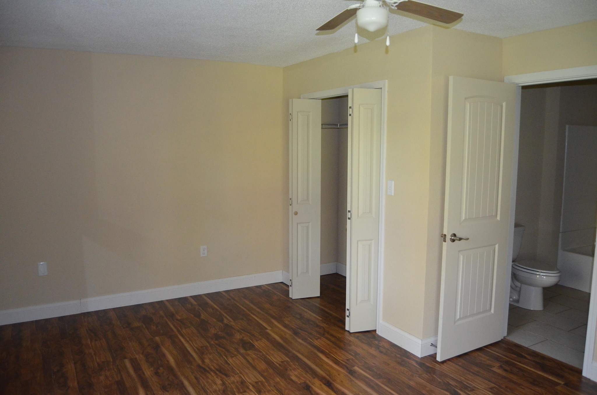 190 Meister Hills Road Deer Lodge, TN 37726 - Photo 16 of 40 a view of a room with wooden floor and a ceiling fan