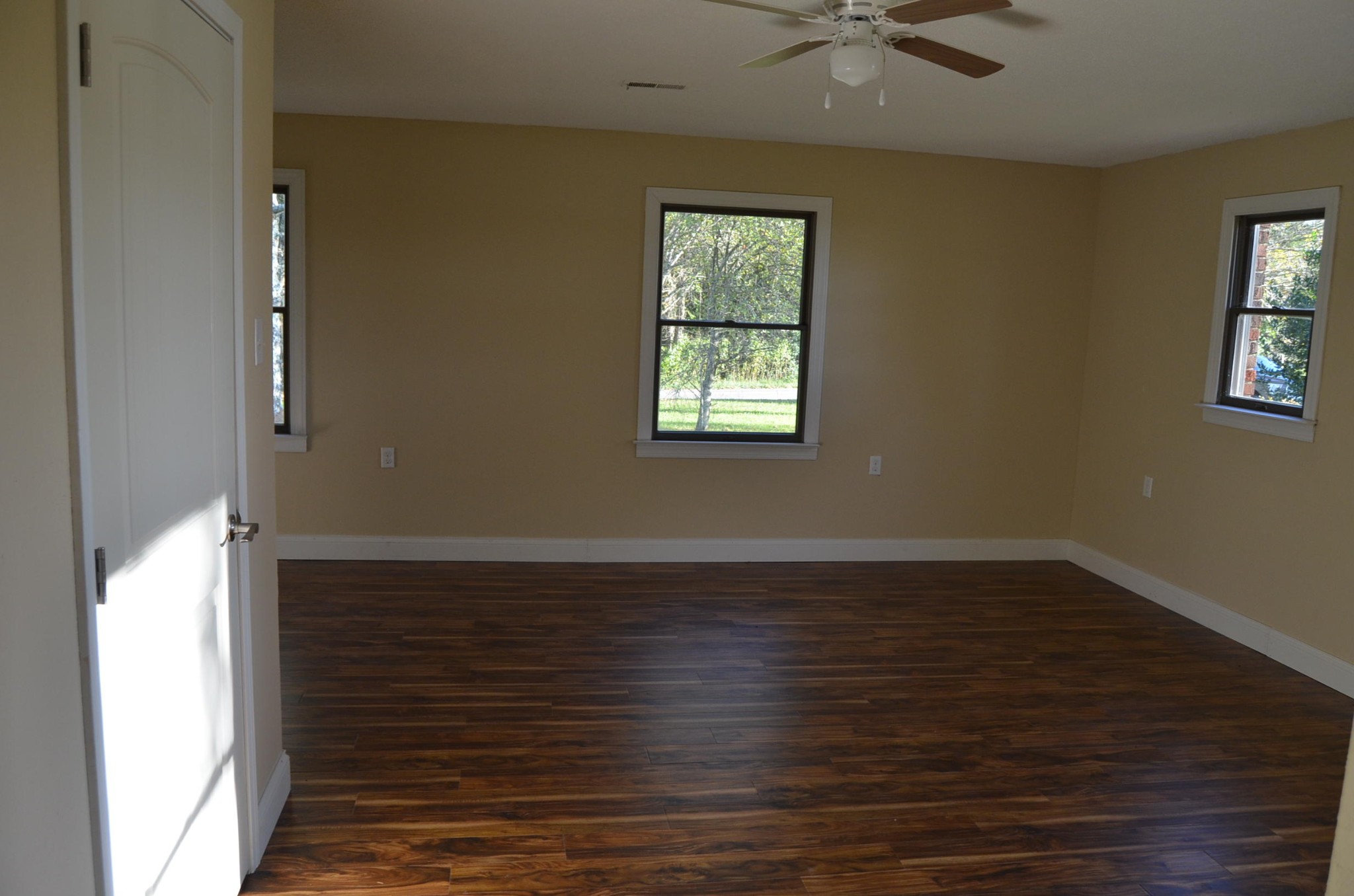 190 Meister Hills Road Deer Lodge, TN 37726 - Photo 18 of 40 a view of an empty room with wooden floor and a window