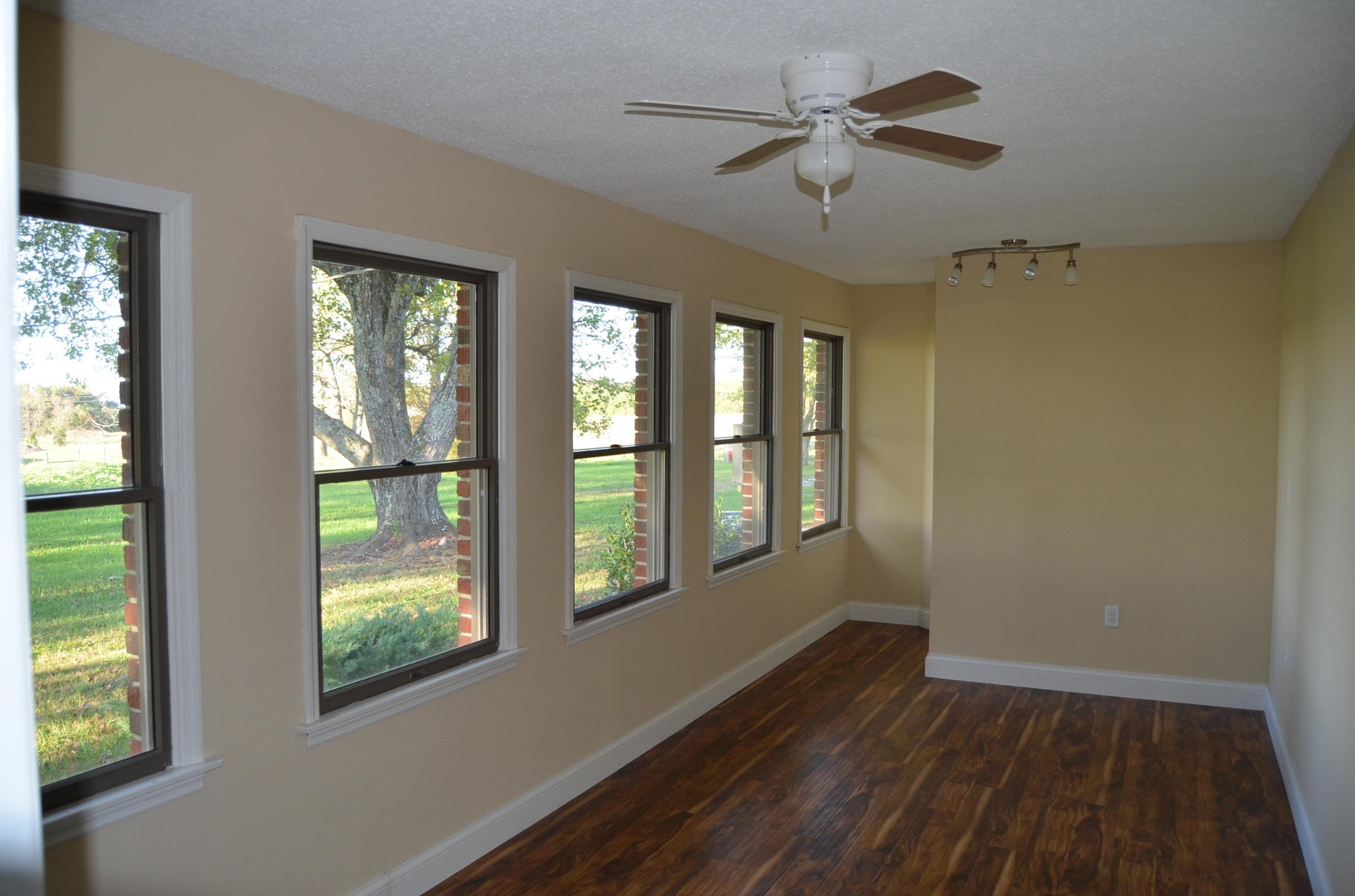 190 Meister Hills Road Deer Lodge, TN 37726 - Photo 24 of 40 a view of an empty room with a window and wooden floor