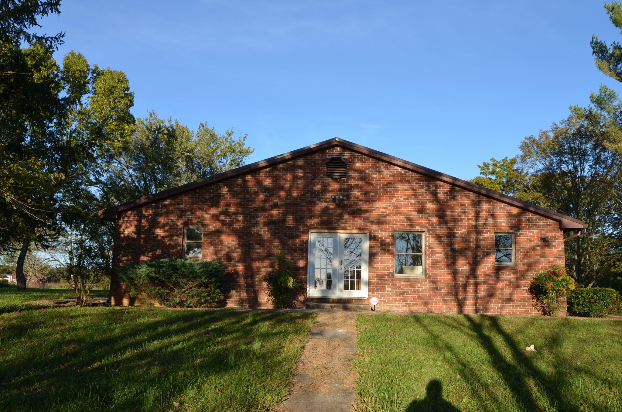 190 Meister Hills Road Deer Lodge, TN 37726 - Photo 32 of 40 a view of a white house with a big yard