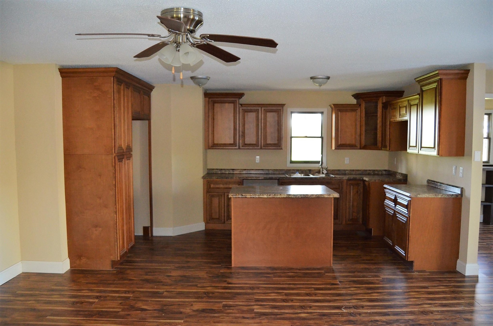 190 Meister Hills Road Deer Lodge, TN 37726 - Photo 8 of 40 a kitchen with stainless steel appliances granite countertop a stove a sink and a refrigerator