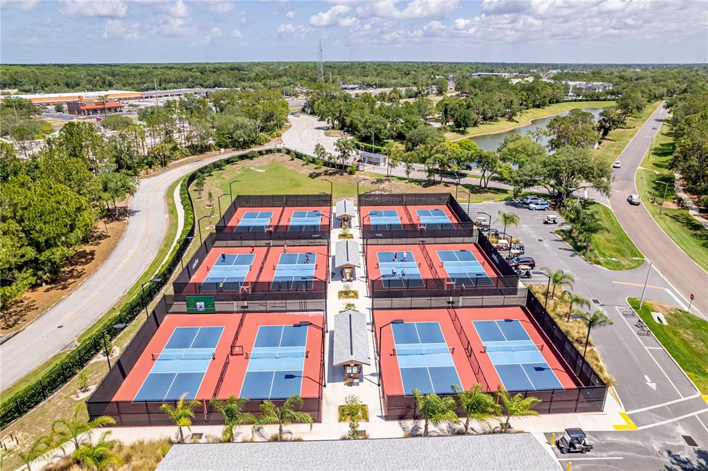 7443 Willowbrook Drive Spring Hill, FL 34606 - Photo 53 of 54 an aerial view of residential houses with yard