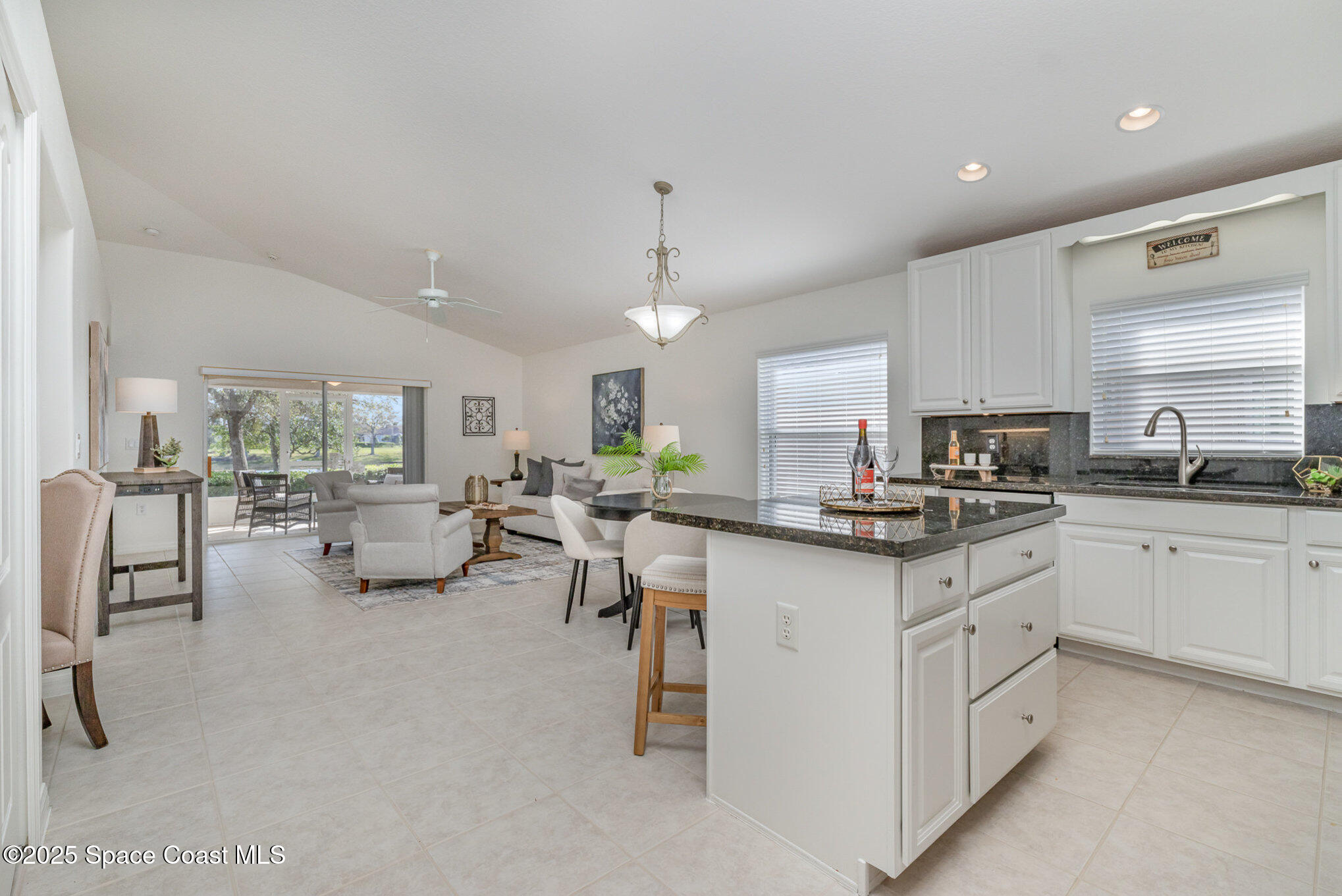 3053 Galindo Circle Melbourne, FL 32940 - Photo 15 of 83 a kitchen with sink cabinets and counter space