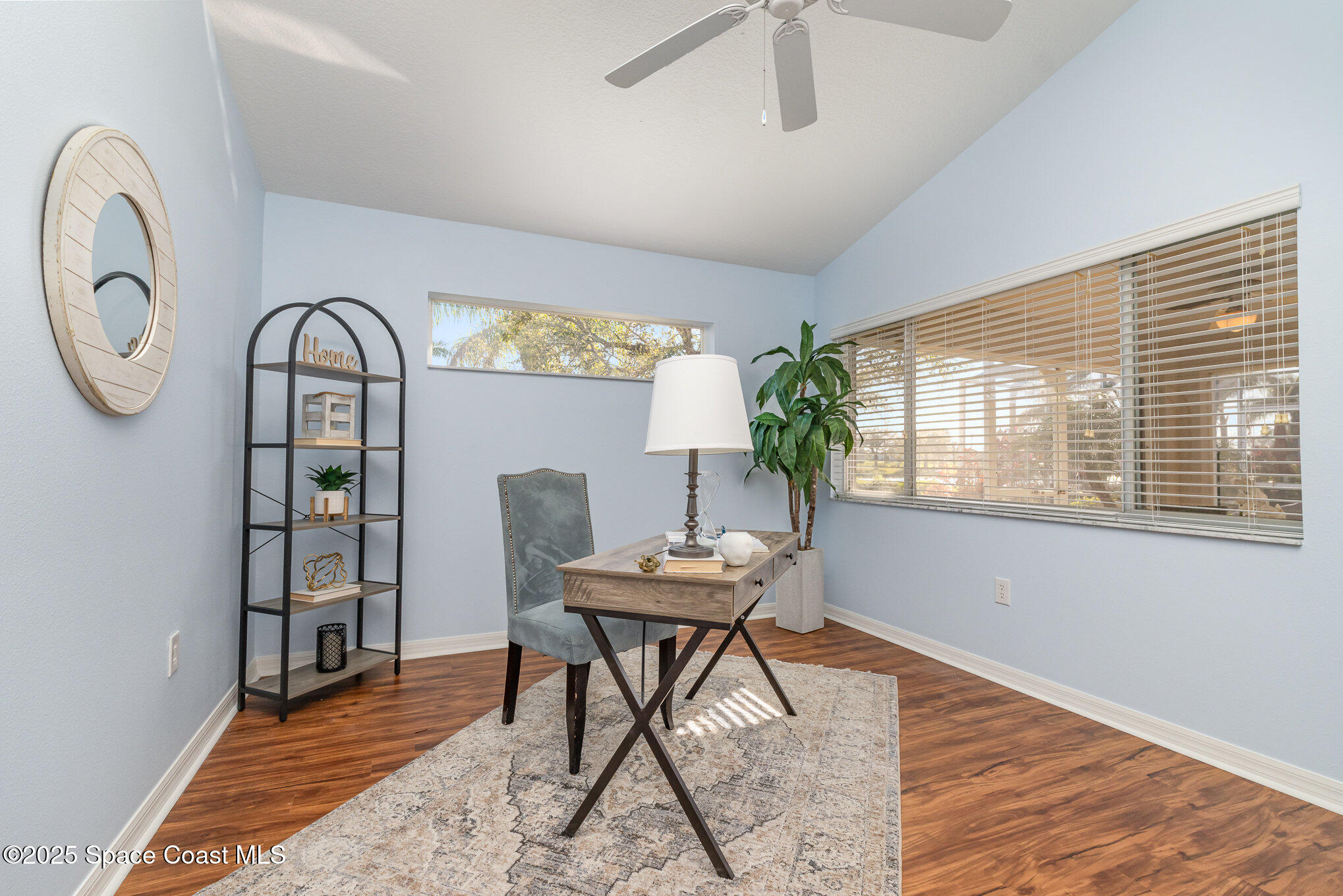 3053 Galindo Circle Melbourne, FL 32940 - Photo 20 of 83 a workspace with furniture and window