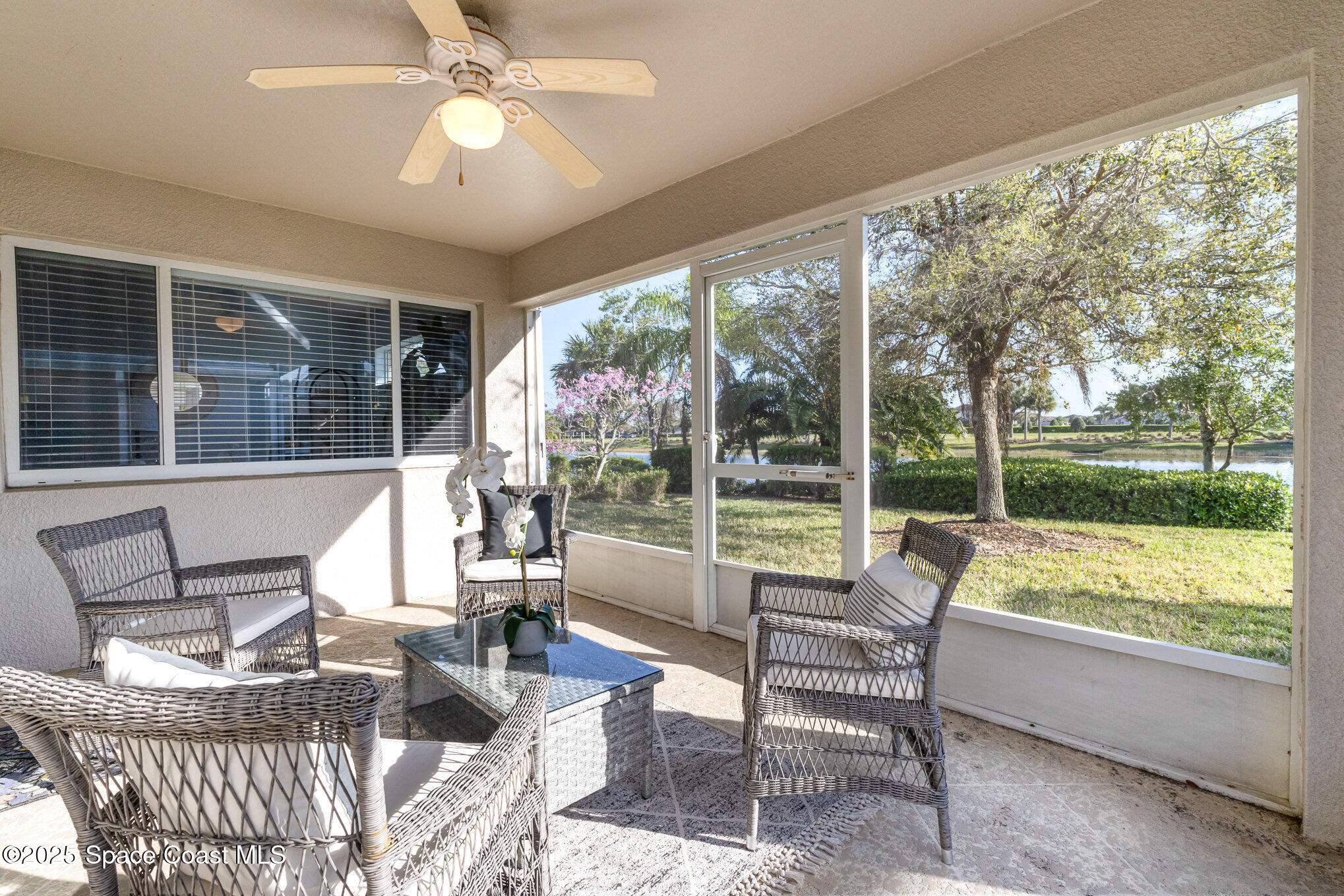 3053 Galindo Circle Melbourne, FL 32940 - Photo 30 of 83 a living room with furniture and a large window