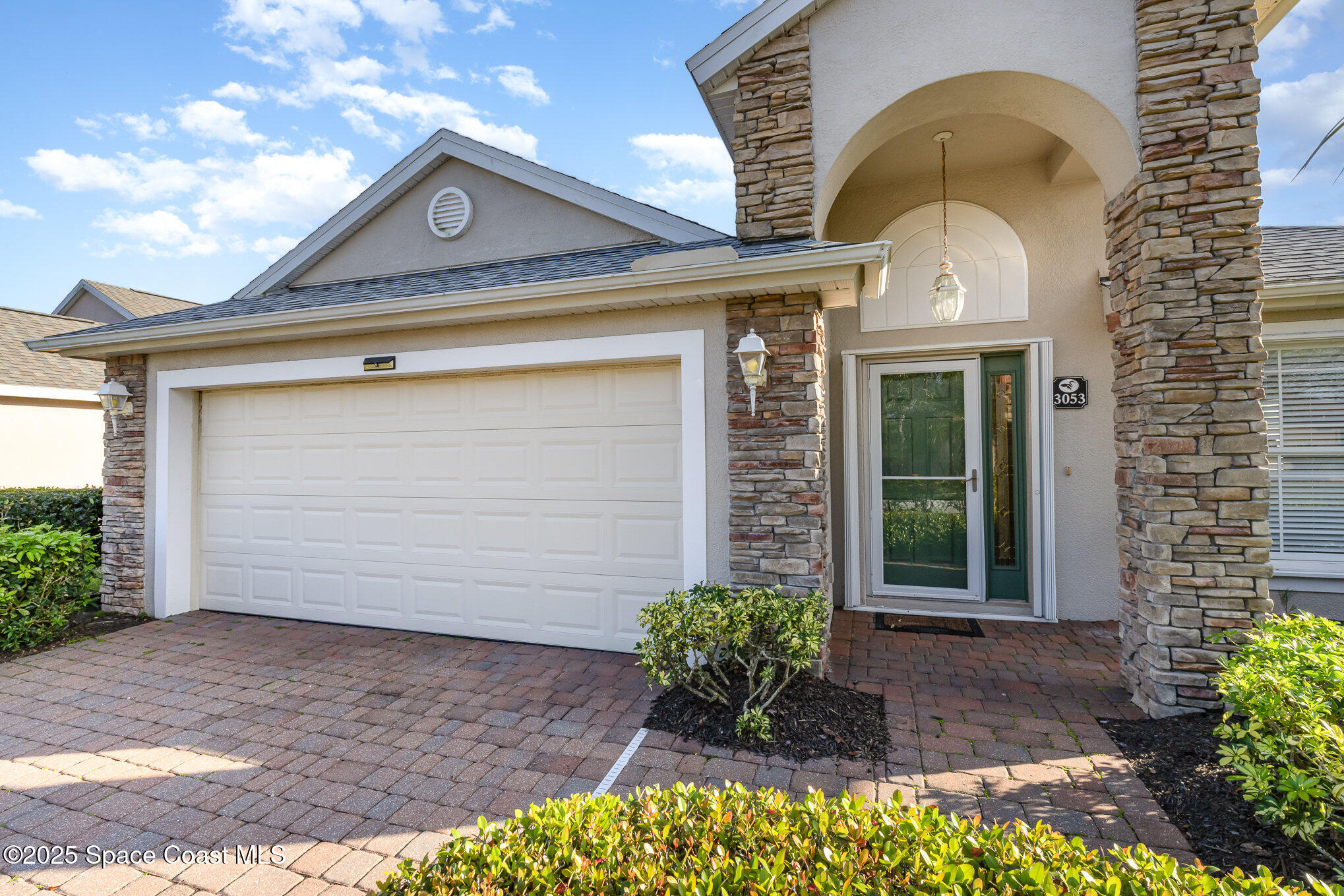 3053 Galindo Circle Melbourne, FL 32940 - Photo 4 of 83 a front view of a house with a yard