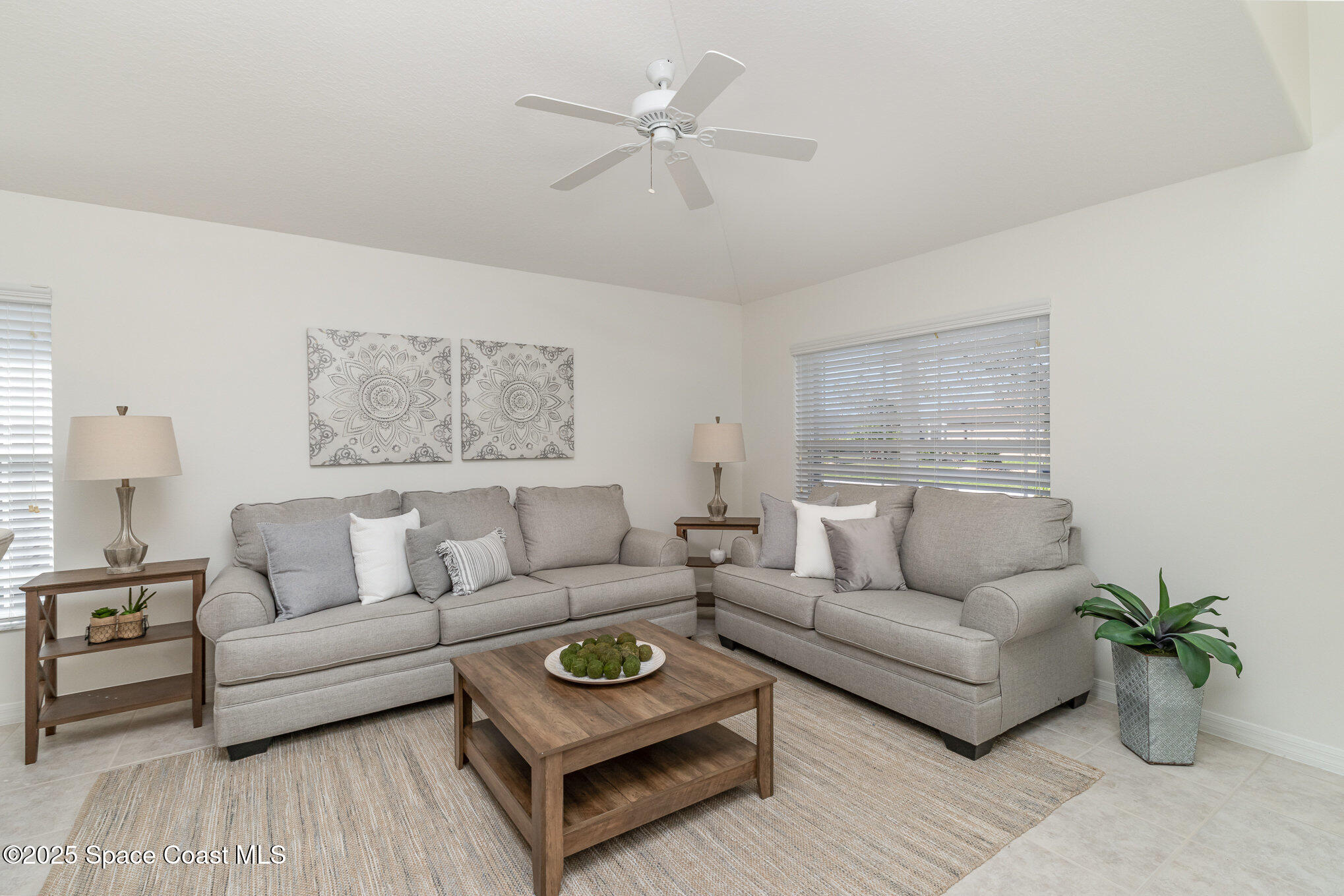 3053 Galindo Circle Melbourne, FL 32940 - Photo 5 of 83 a living room with furniture and a couch