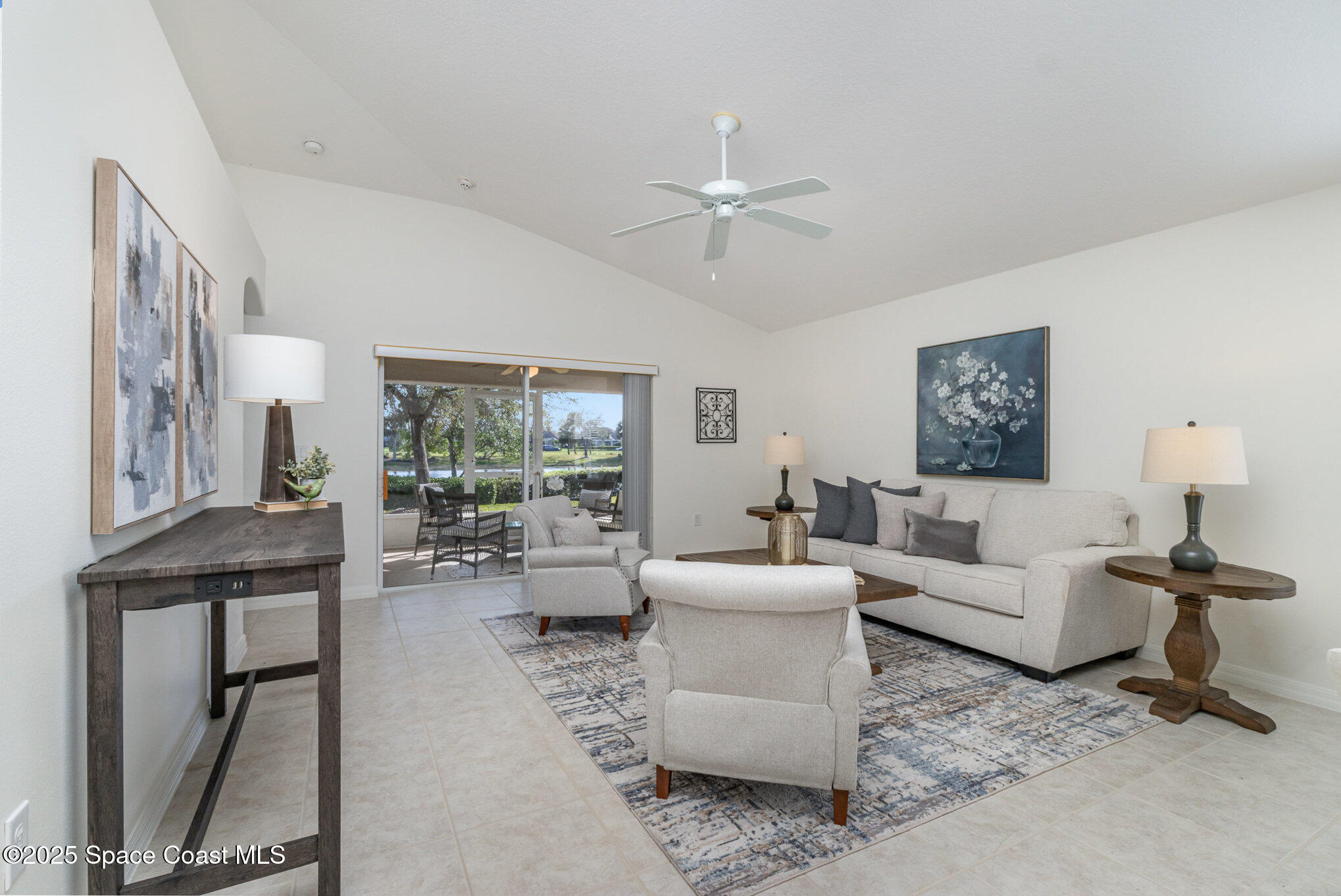 3053 Galindo Circle Melbourne, FL 32940 - Photo 7 of 83 a living room with furniture and a large window