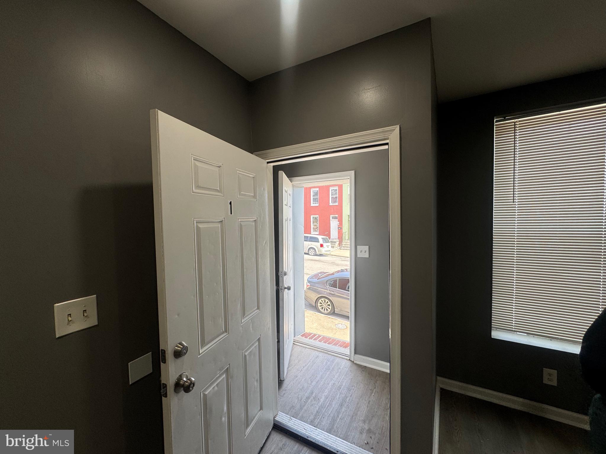 1108 North Bond Street, Unit 1 Baltimore, MD 21213 - Photo 8 of 20 a view of elevator with hallway