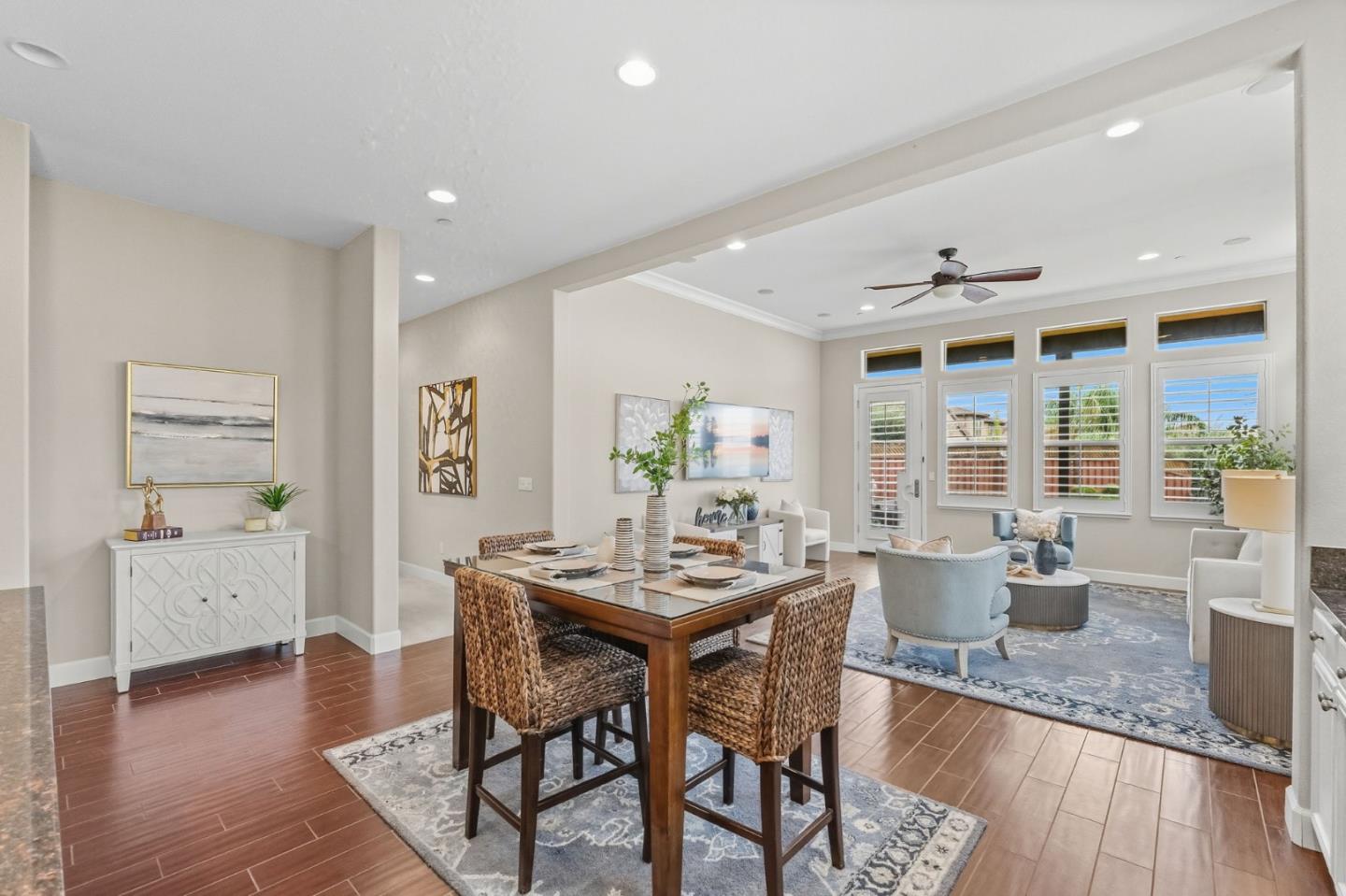 3716 Chiavari Way Manteca, CA 95337 - Photo 18 of 71 a view of a dining room with furniture and wooden floor
