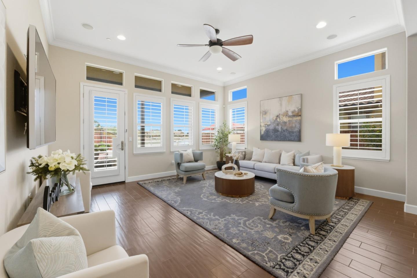 3716 Chiavari Way Manteca, CA 95337 - Photo 23 of 71 a living room with furniture and floor to ceiling windows