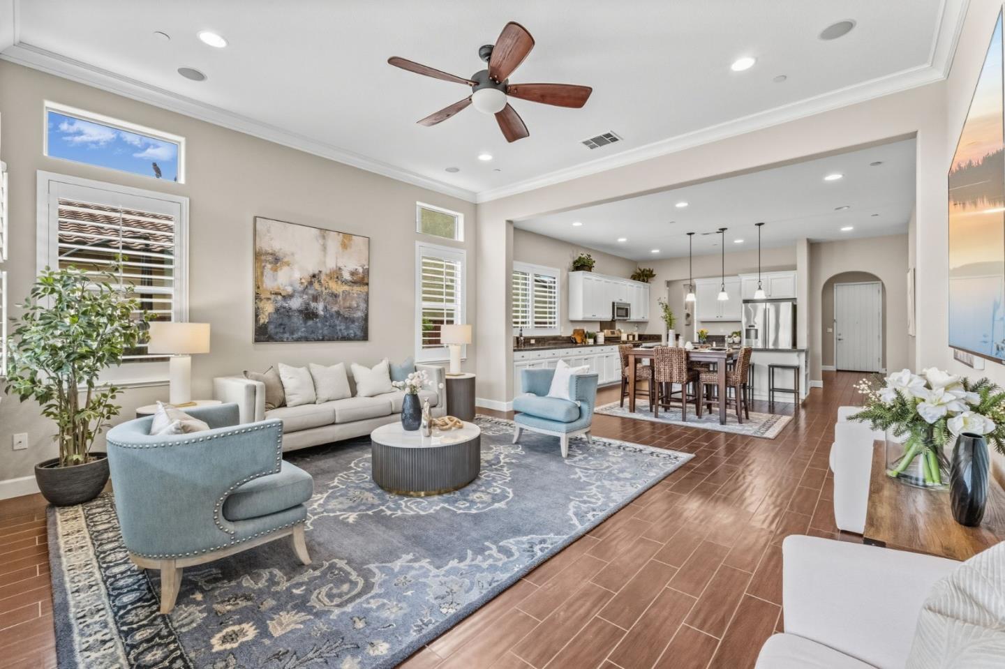 3716 Chiavari Way Manteca, CA 95337 - Photo 25 of 71 a living room with lots of furniture and a potted plant