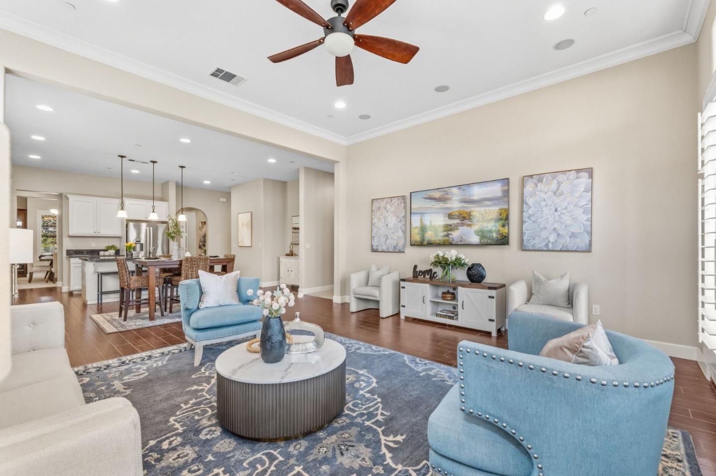 3716 Chiavari Way Manteca, CA 95337 - Photo 26 of 71 a living room with furniture and a view of kitchen