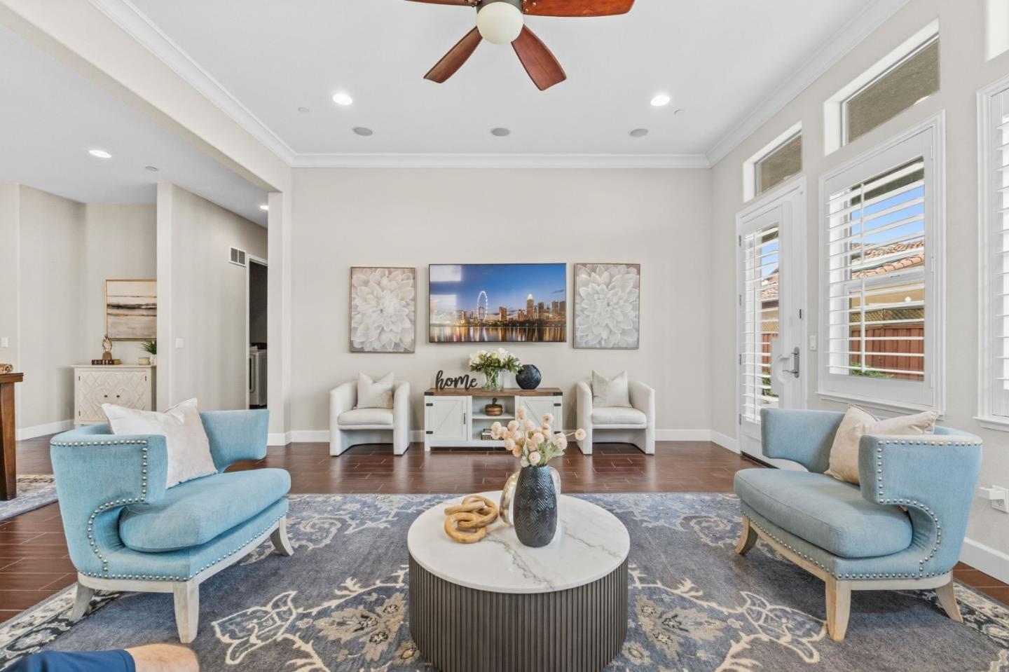 3716 Chiavari Way Manteca, CA 95337 - Photo 27 of 71 a living room with furniture and a wooden floor