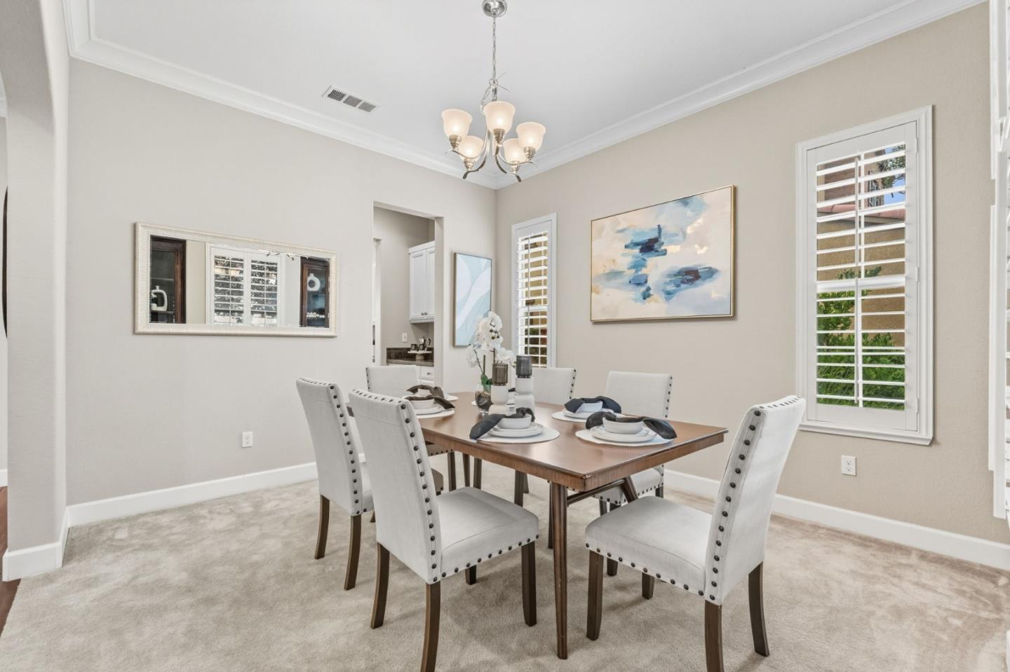 3716 Chiavari Way Manteca, CA 95337 - Photo 30 of 71 a dining room with furniture and window