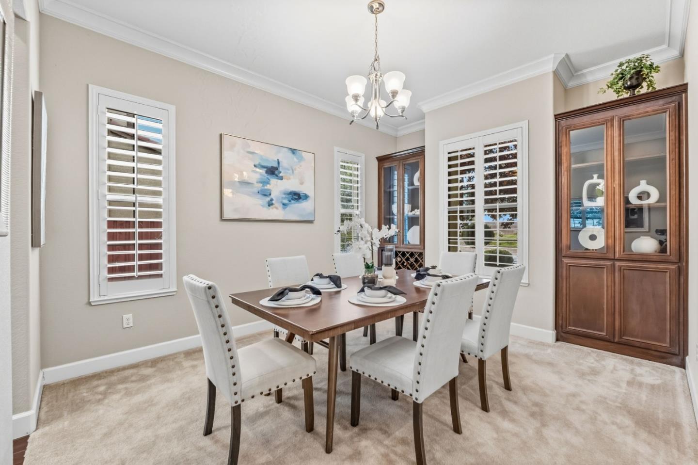 3716 Chiavari Way Manteca, CA 95337 - Photo 32 of 71 a view of a dining room with furniture and window