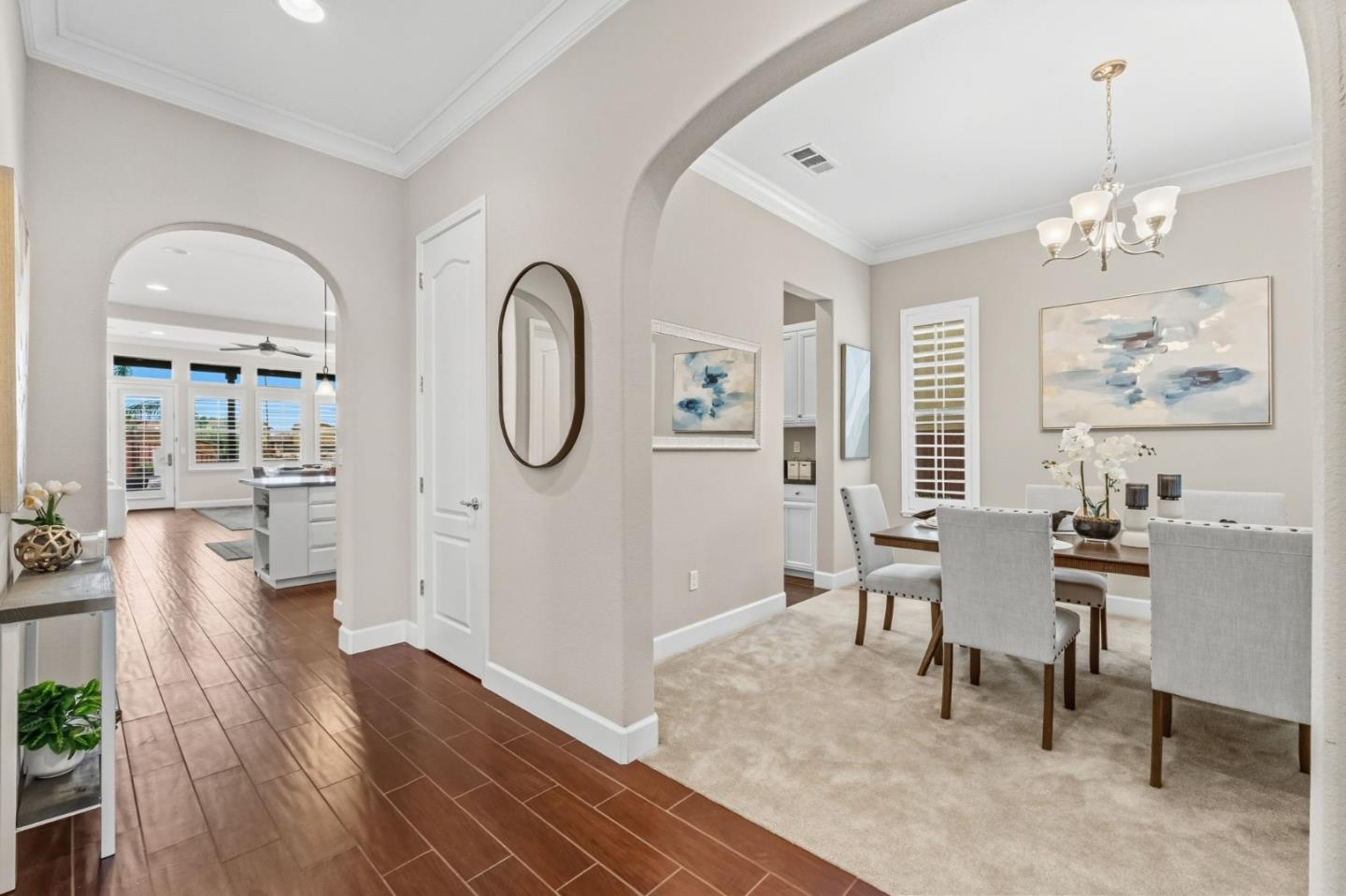 3716 Chiavari Way Manteca, CA 95337 - Photo 33 of 71 a view of a livingroom with furniture window and wooden floor