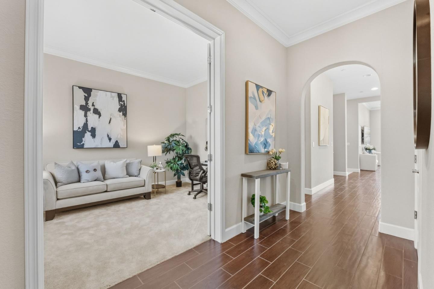 3716 Chiavari Way Manteca, CA 95337 - Photo 34 of 71 a living room with furniture and wooden floor