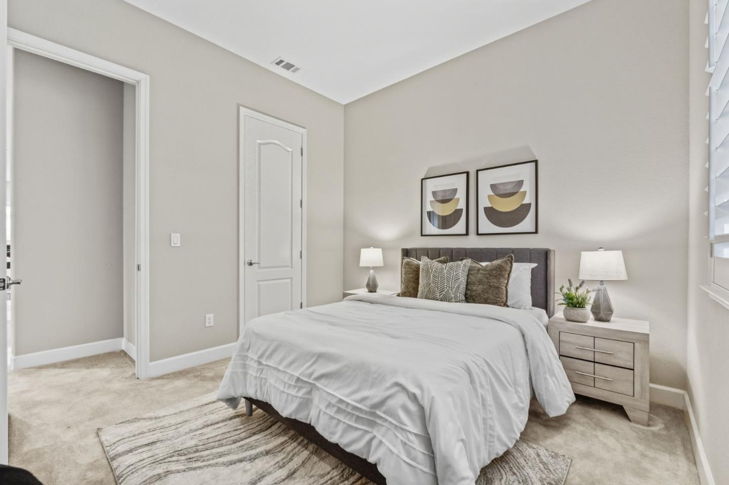 3716 Chiavari Way Manteca, CA 95337 - Photo 40 of 71 a bedroom with a bed and painting on the wall
