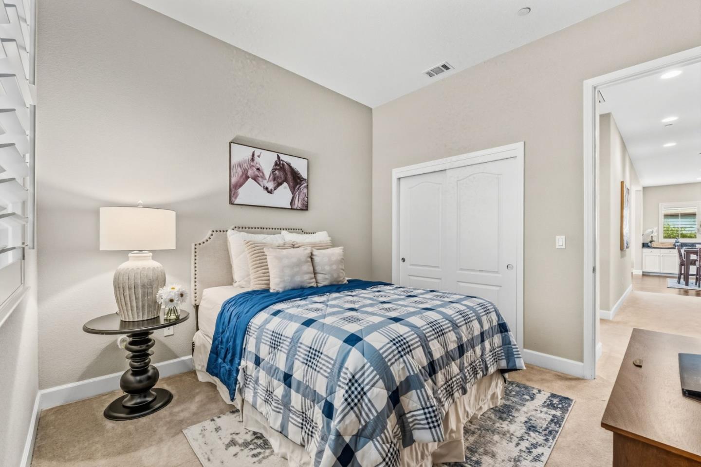 3716 Chiavari Way Manteca, CA 95337 - Photo 42 of 71 a bedroom with a bed and wooden floor