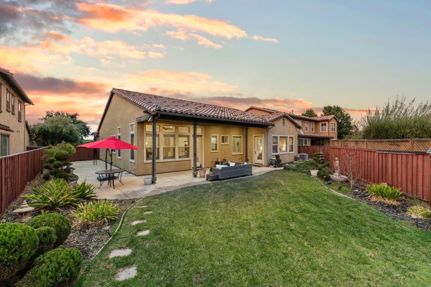 3716 Chiavari Way Manteca, CA 95337 - Photo 5 of 71 a view of a house with backyard sitting area and garden