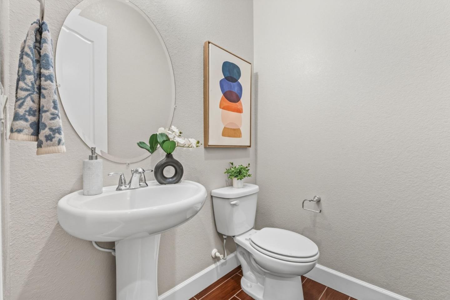 3716 Chiavari Way Manteca, CA 95337 - Photo 54 of 71 a bathroom with a toilet sink and mirror