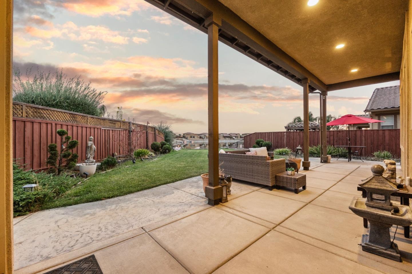 3716 Chiavari Way Manteca, CA 95337 - Photo 68 of 71 a building outdoor space with patio furniture and garden