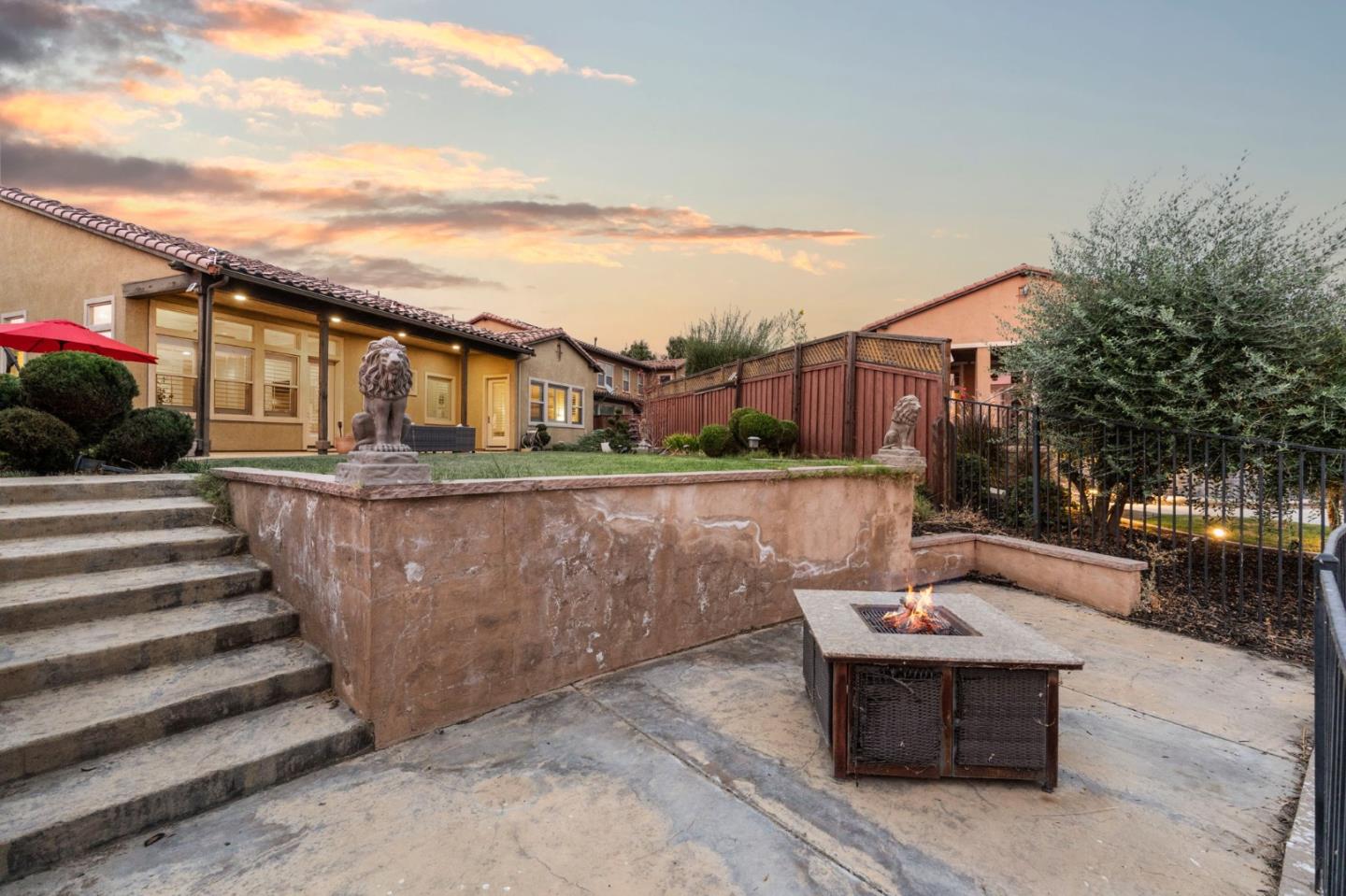 3716 Chiavari Way Manteca, CA 95337 - Photo 71 of 71 a view of a terrace with a bench and potted plants