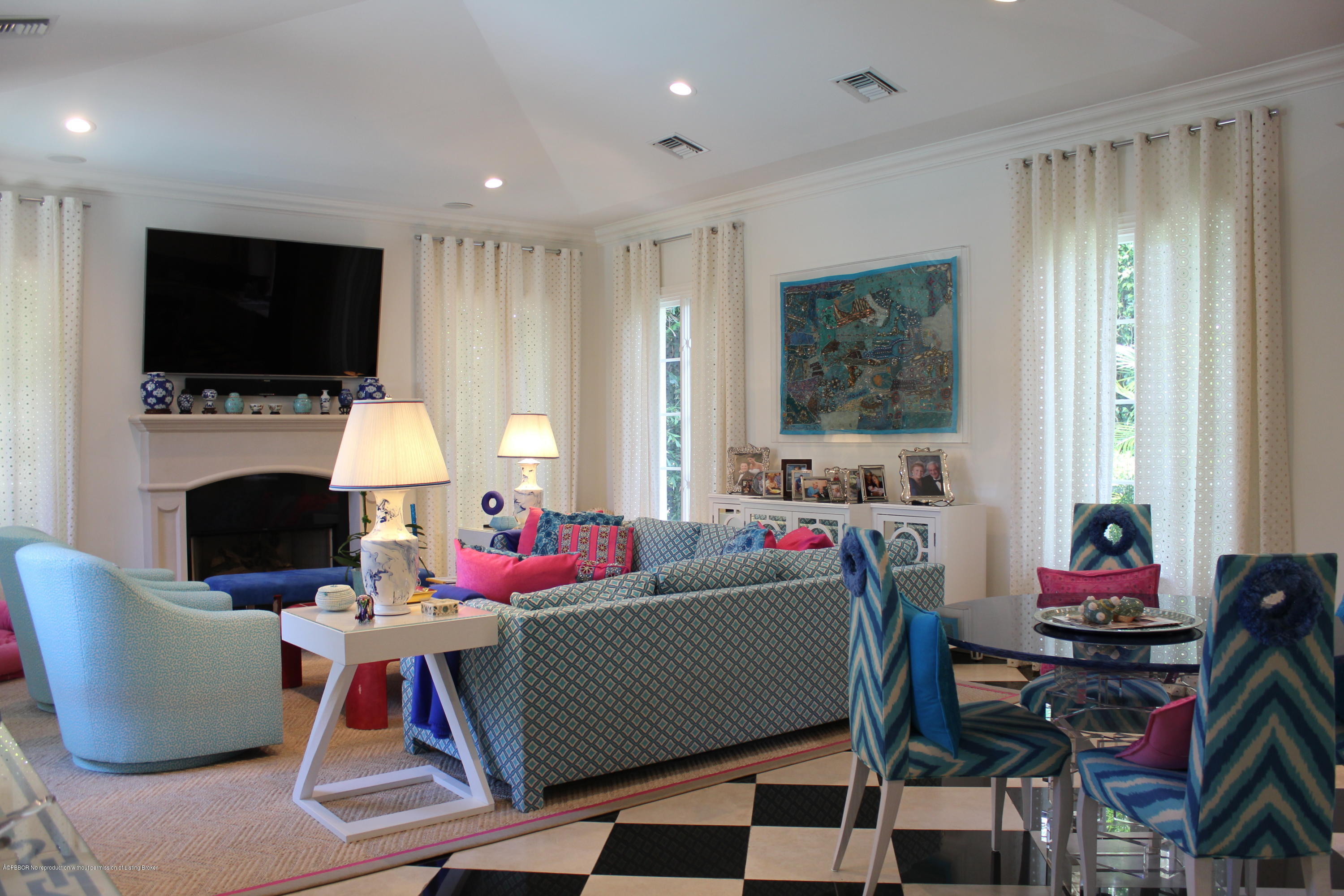 238 Plantation Road Palm Beach, FL 33480 - Photo 6 of 17 a living room with furniture a flat screen tv and a window