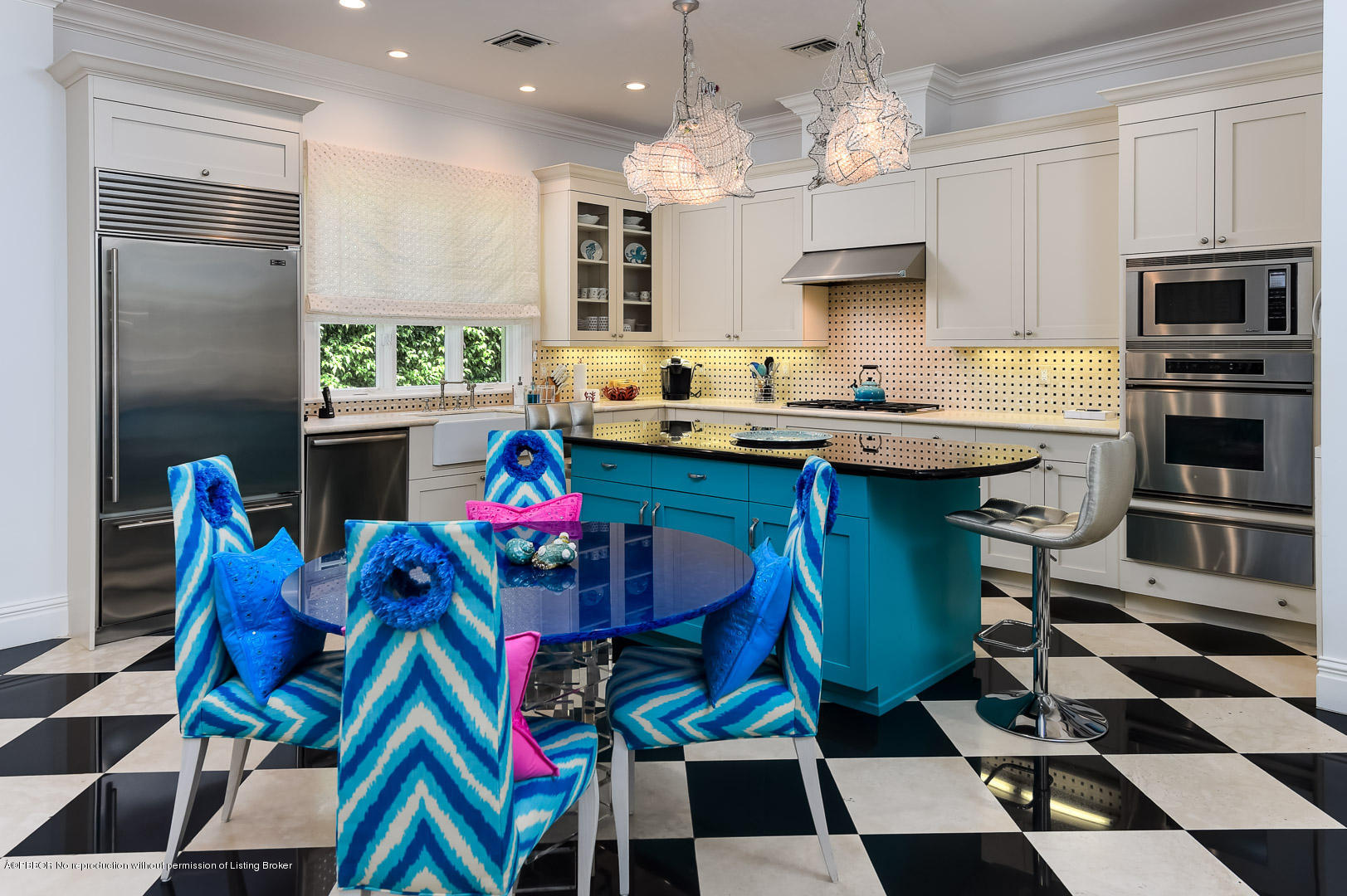 238 Plantation Road Palm Beach, FL 33480 - Photo 8 of 17 a kitchen with stainless steel appliances kitchen island granite countertop a sink a stove and a refrigerator