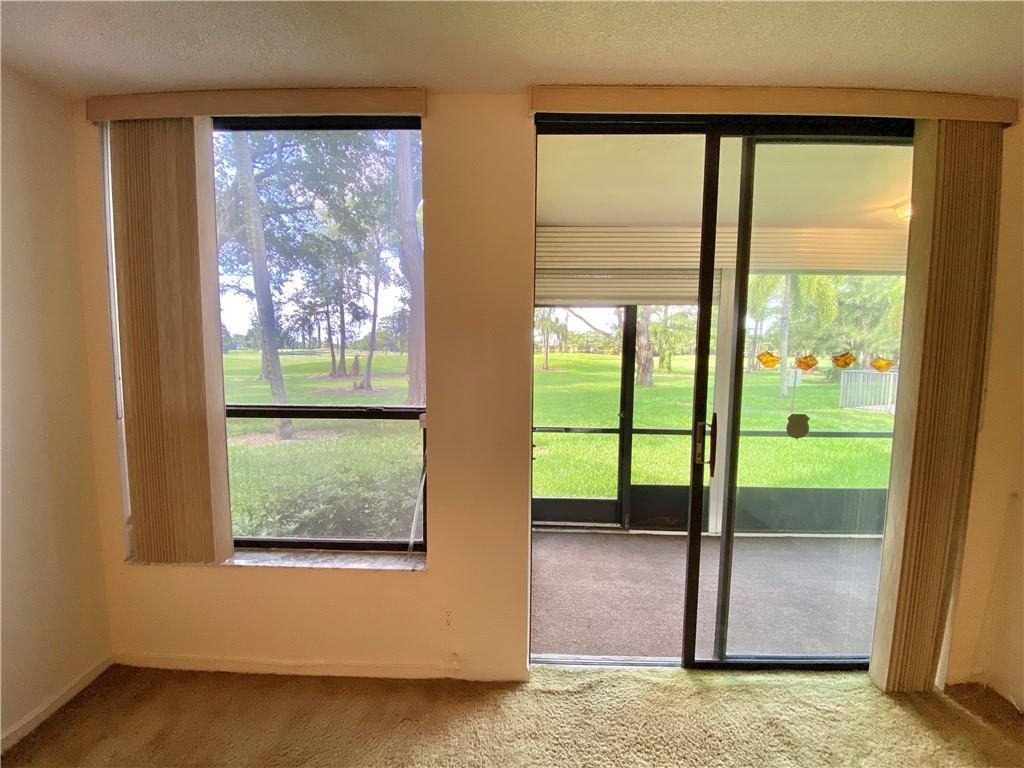 7650 West McNab Road, Unit 108 Tamarac, FL 33321 - Photo 12 of 18 a view of an entryway