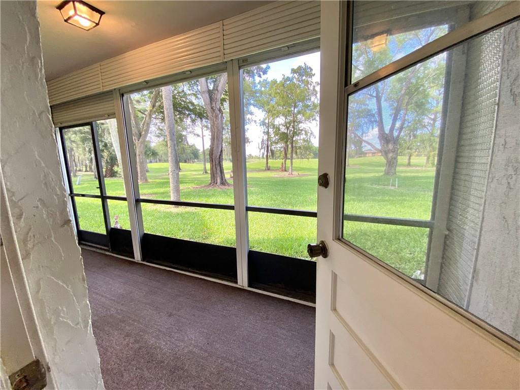 7650 West McNab Road, Unit 108 Tamarac, FL 33321 - Photo 13 of 18 a view of an outdoor space and seating