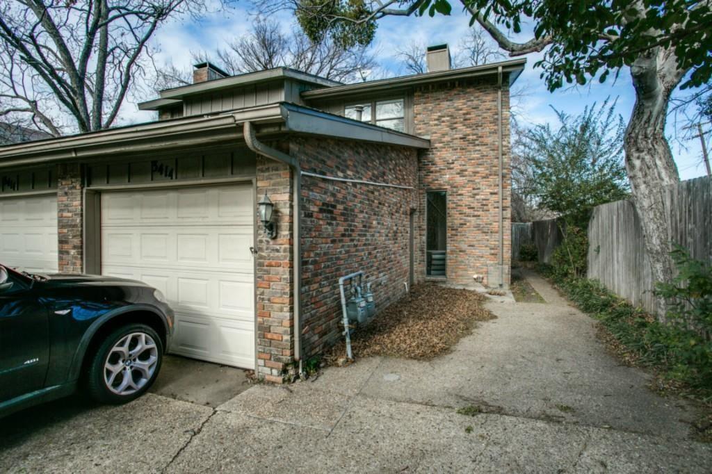 a front view of a house with garage