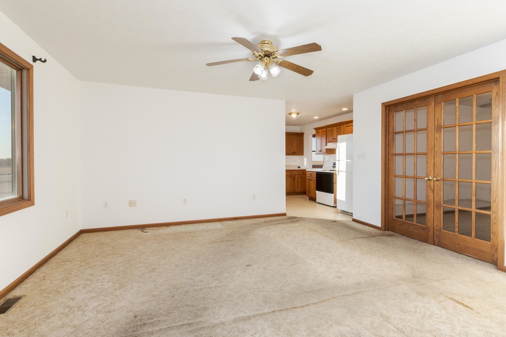 23601 North 1700 E Road Odell, IL 60460 - Photo 27 of 49 an empty room with a ceiling fan and window