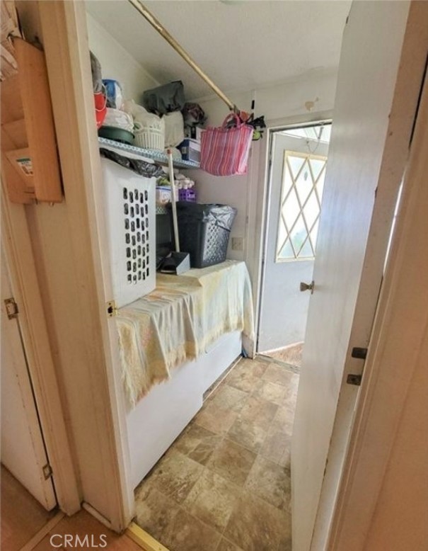 2500 North State Highway 59, Unit 278 Merced, CA 95348 - Photo 15 of 25 a living room with furniture and a baby crib