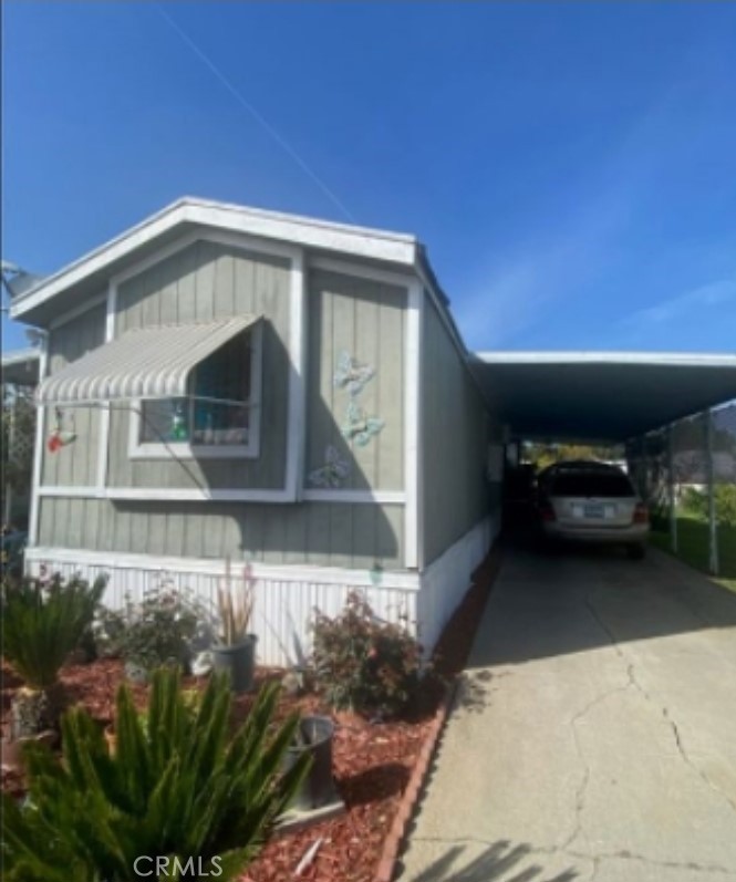 2500 North State Highway 59, Unit 278 Merced, CA 95348 - Photo 2 of 25 a front view of a house with a yard