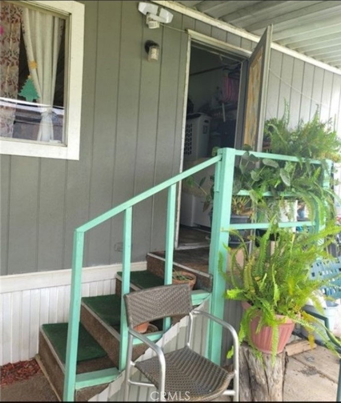 2500 North State Highway 59, Unit 278 Merced, CA 95348 - Photo 25 of 25 a balcony with table and chairs