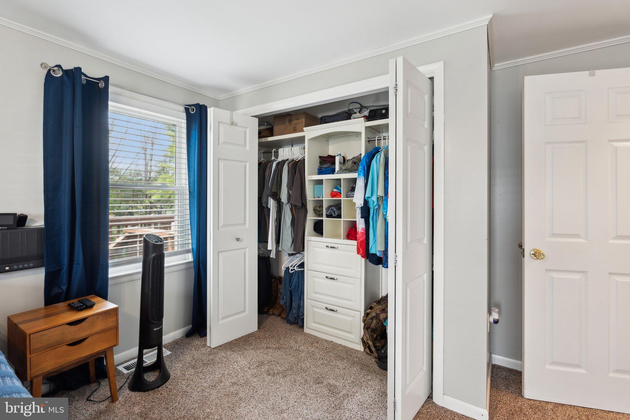 220 Lamphier Street Culpeper, VA 22701 - Photo 21 of 51 a view of room with closet and windows