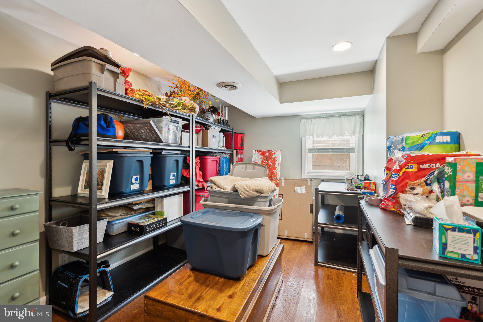 220 Lamphier Street Culpeper, VA 22701 - Photo 37 of 51 a living room with furniture and a book shelf