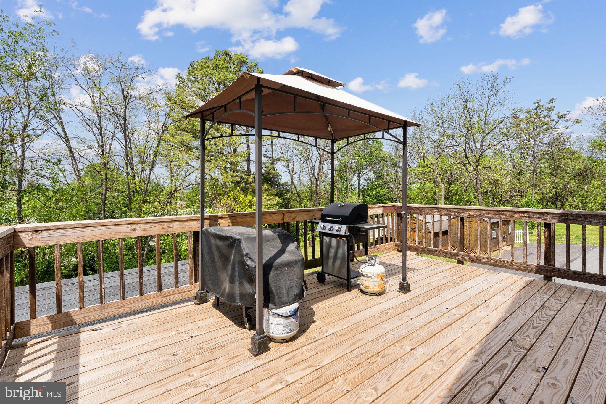 220 Lamphier Street Culpeper, VA 22701 - Photo 40 of 51 a view of balcony with wooden floor and outdoor seating