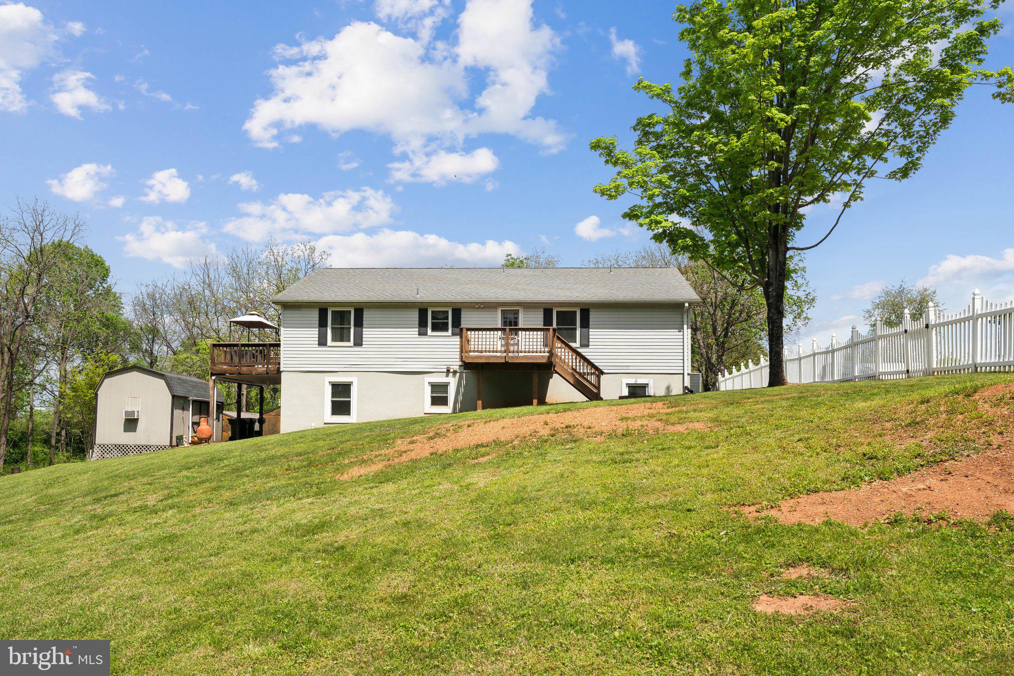 220 Lamphier Street Culpeper, VA 22701 - Photo 43 of 51 a house view with a garden space