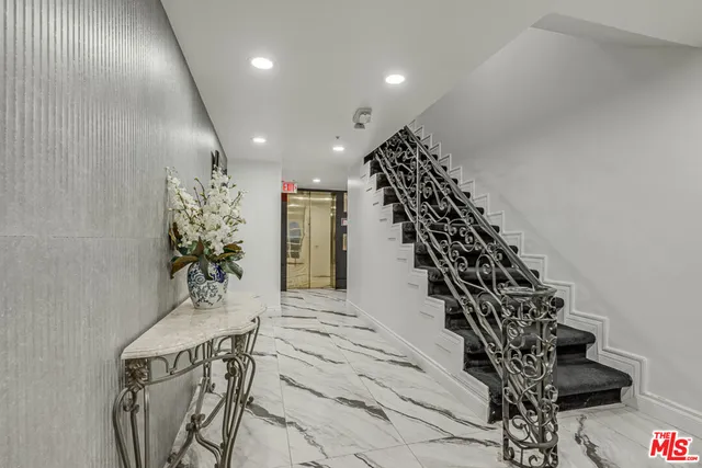 a view of entryway with stairs