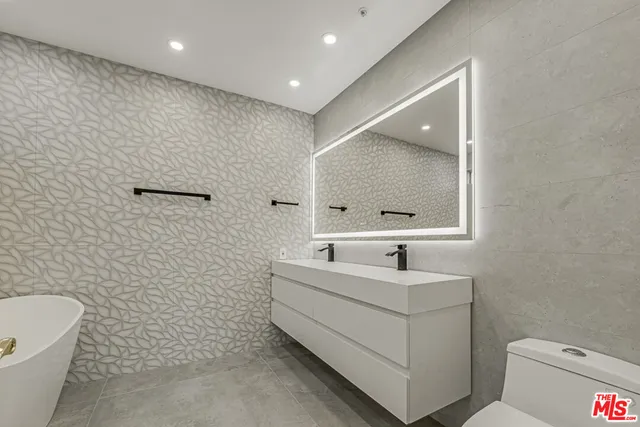 a bathroom with a sink and a bathtub