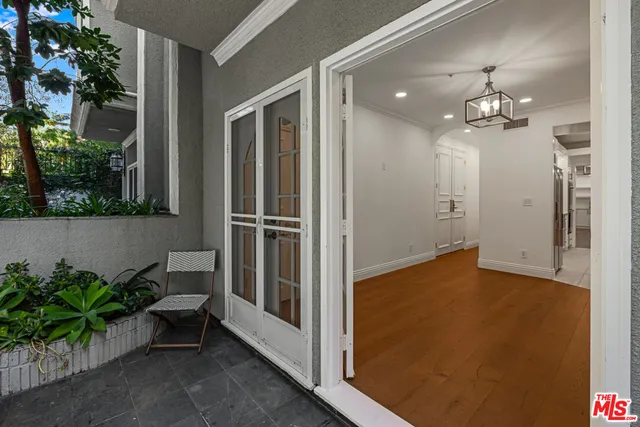 a view of livingroom with furniture and floor to ceiling window