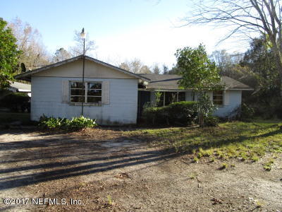 54207 Hurst Road Callahan, FL 32011 - Photo 1 of 12 a front view of a house with garden