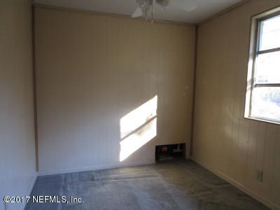 54207 Hurst Road Callahan, FL 32011 - Photo 12 of 12 an empty room with windows