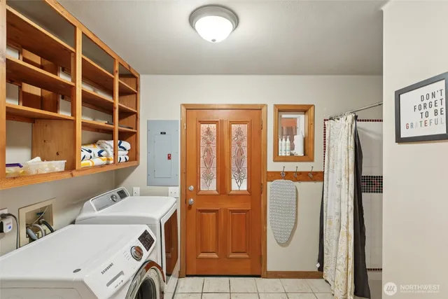 a view of a house with roof and deck