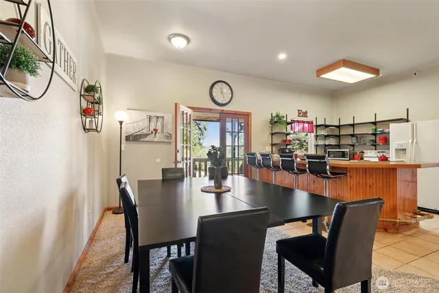 a view of a chair and table in the balcony