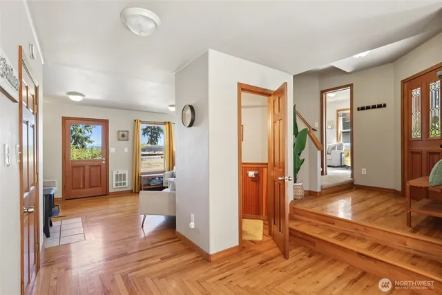 a view of livingroom with hardwood floor and a ceiling fan